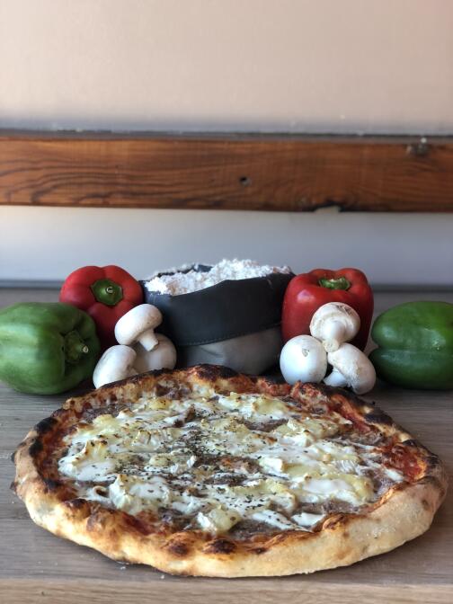 photo d'une pizza normande à Bourg Achard