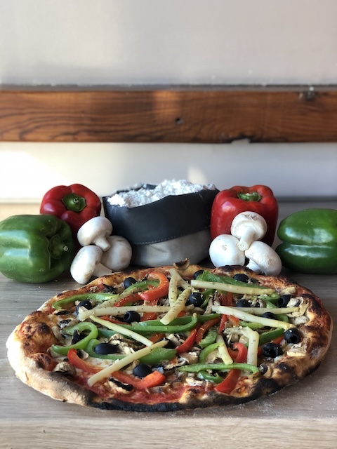 photo d'une pizza végétarienne à Bourg Achard